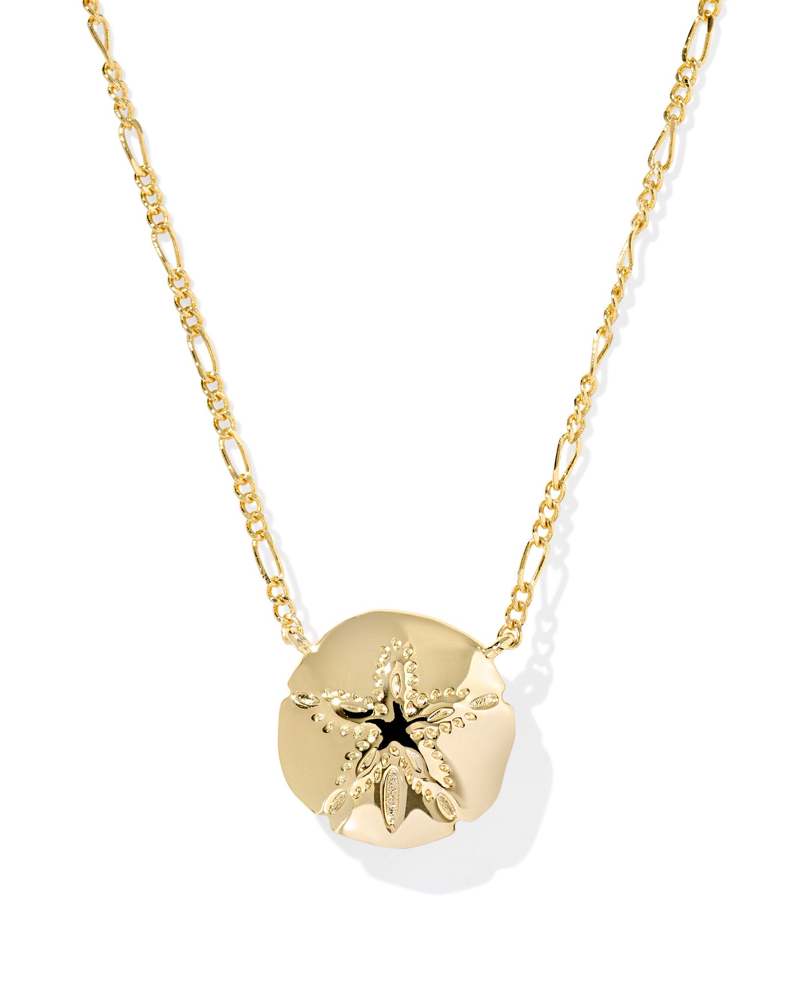 Gold necklace with a round pendant on a white background