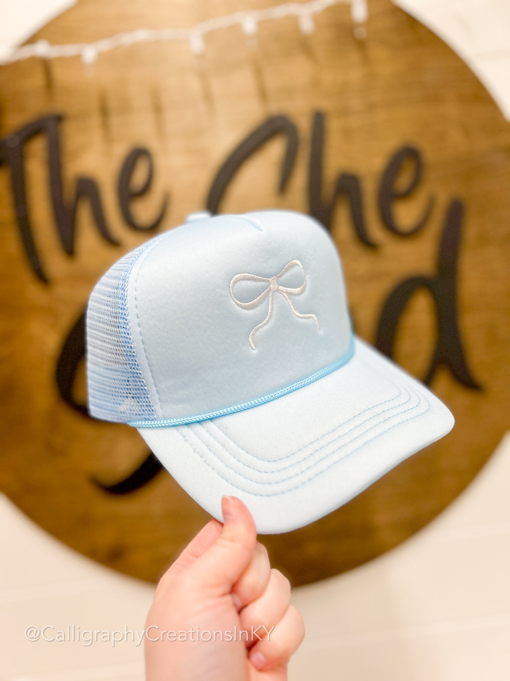 Blue Bow Embroidered Trucker Hat