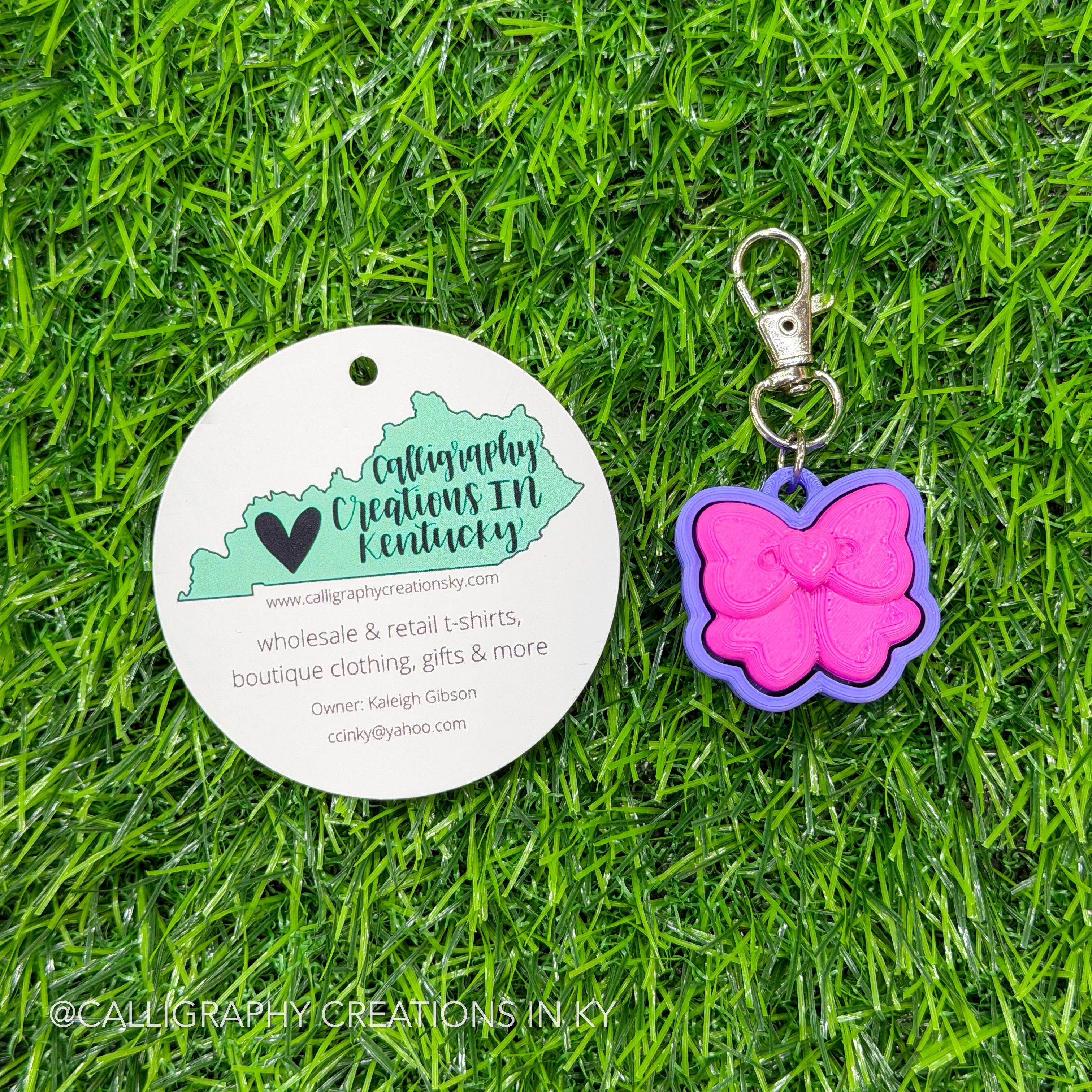 Magenta/Purple Bow Fidget Clicker Keychain