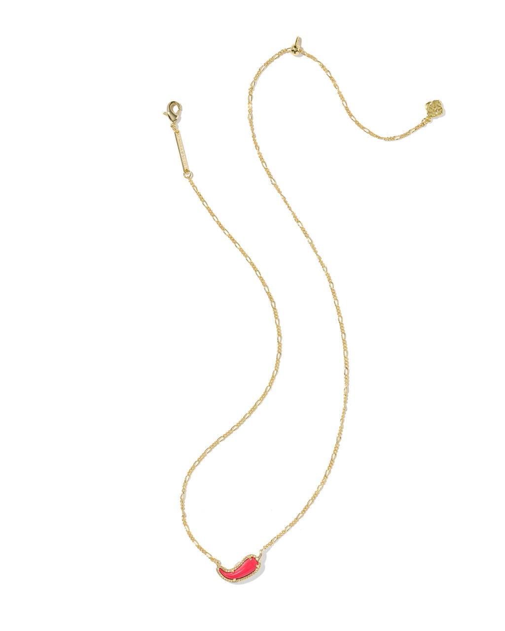A delicate gold chain necklace featuring a small, curved red coral-like pendant, displayed on a clean white background.