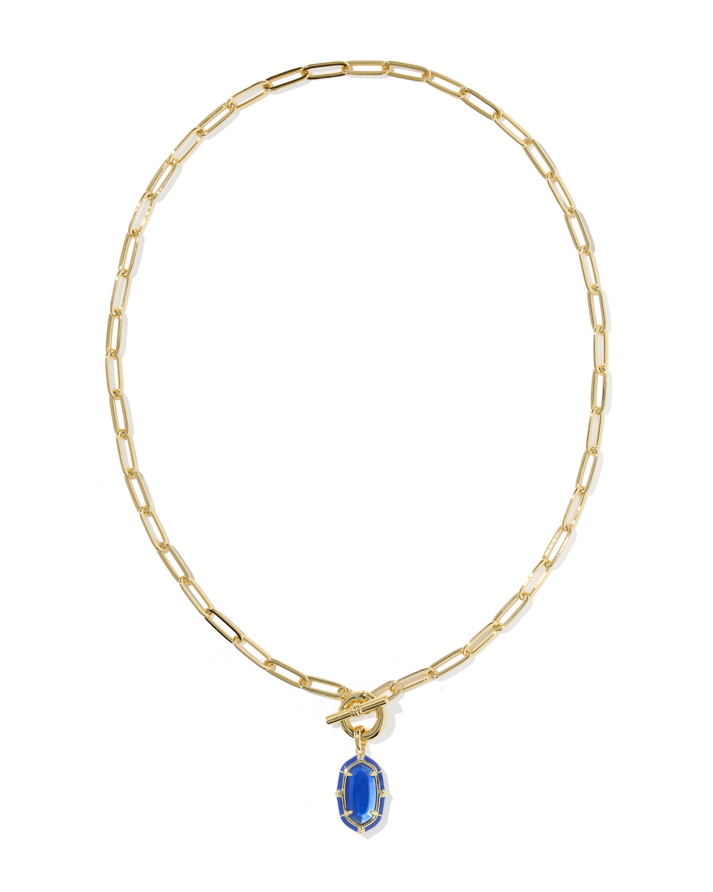 A gold paperclip chain necklace with a toggle clasp and a dangling blue oval gemstone pendant, shown on a plain white background.