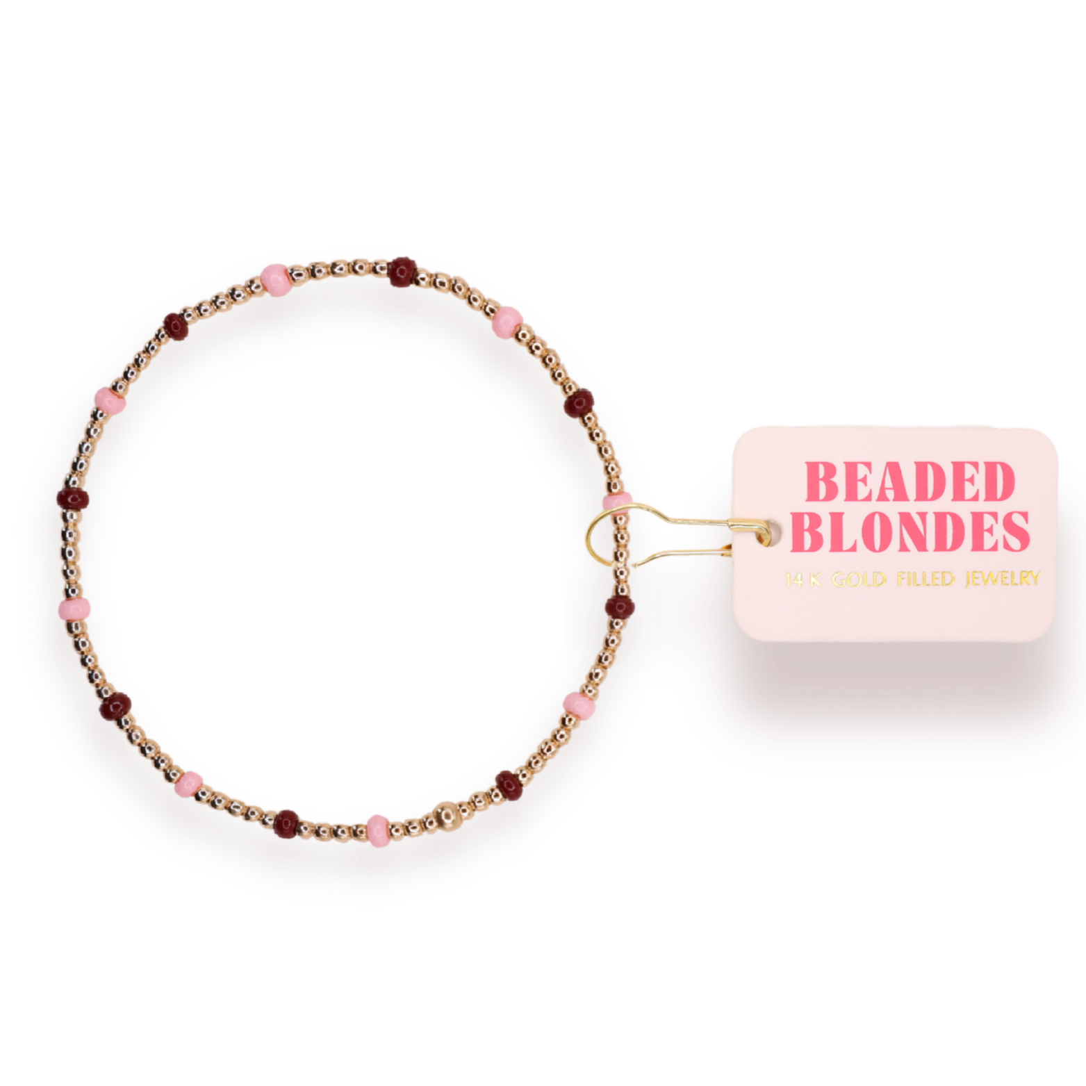Beaded hair tie with 'Beaded Blondes' packaging on a white background
