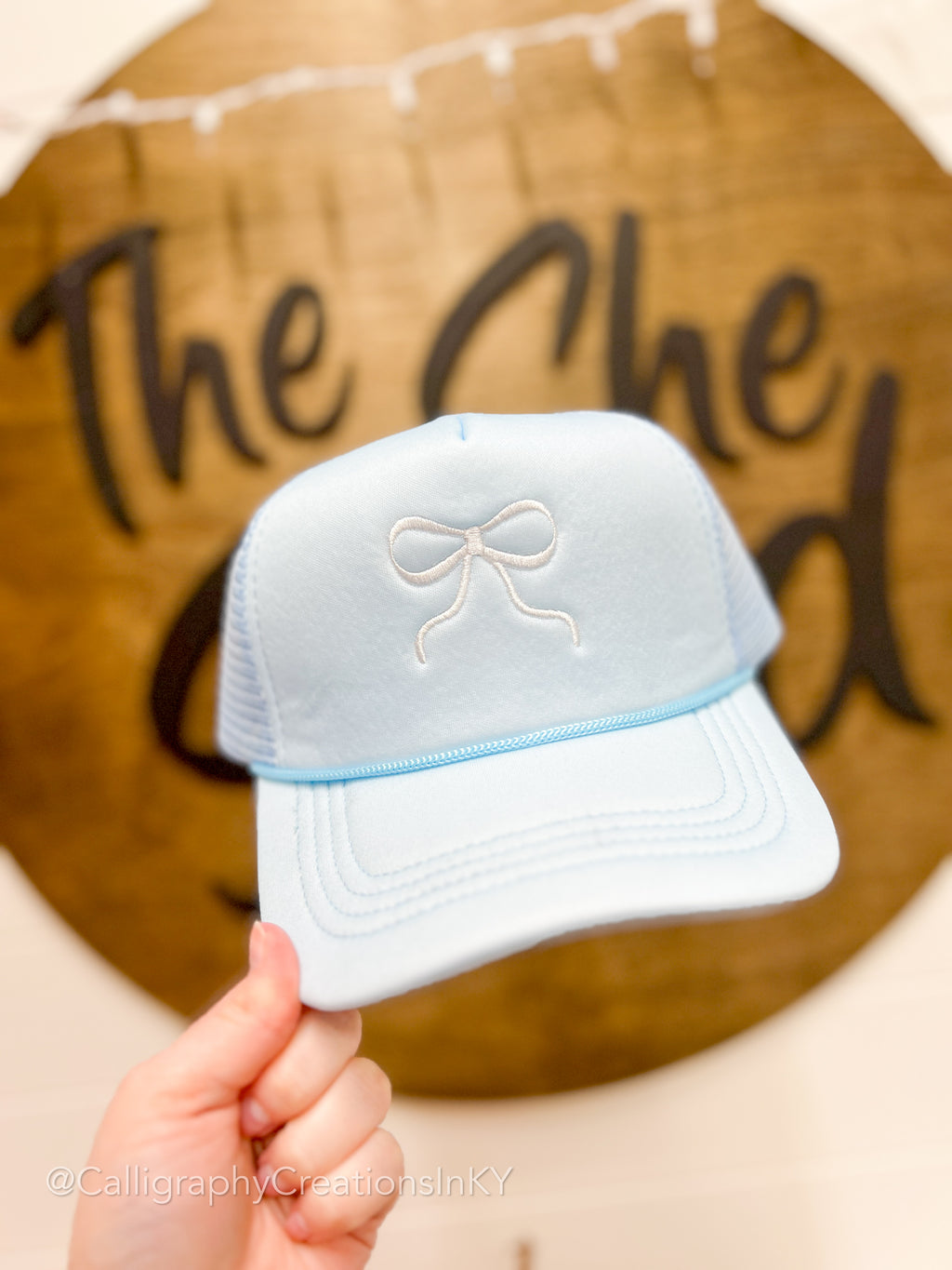 Blue Bow Embroidered Trucker Hat