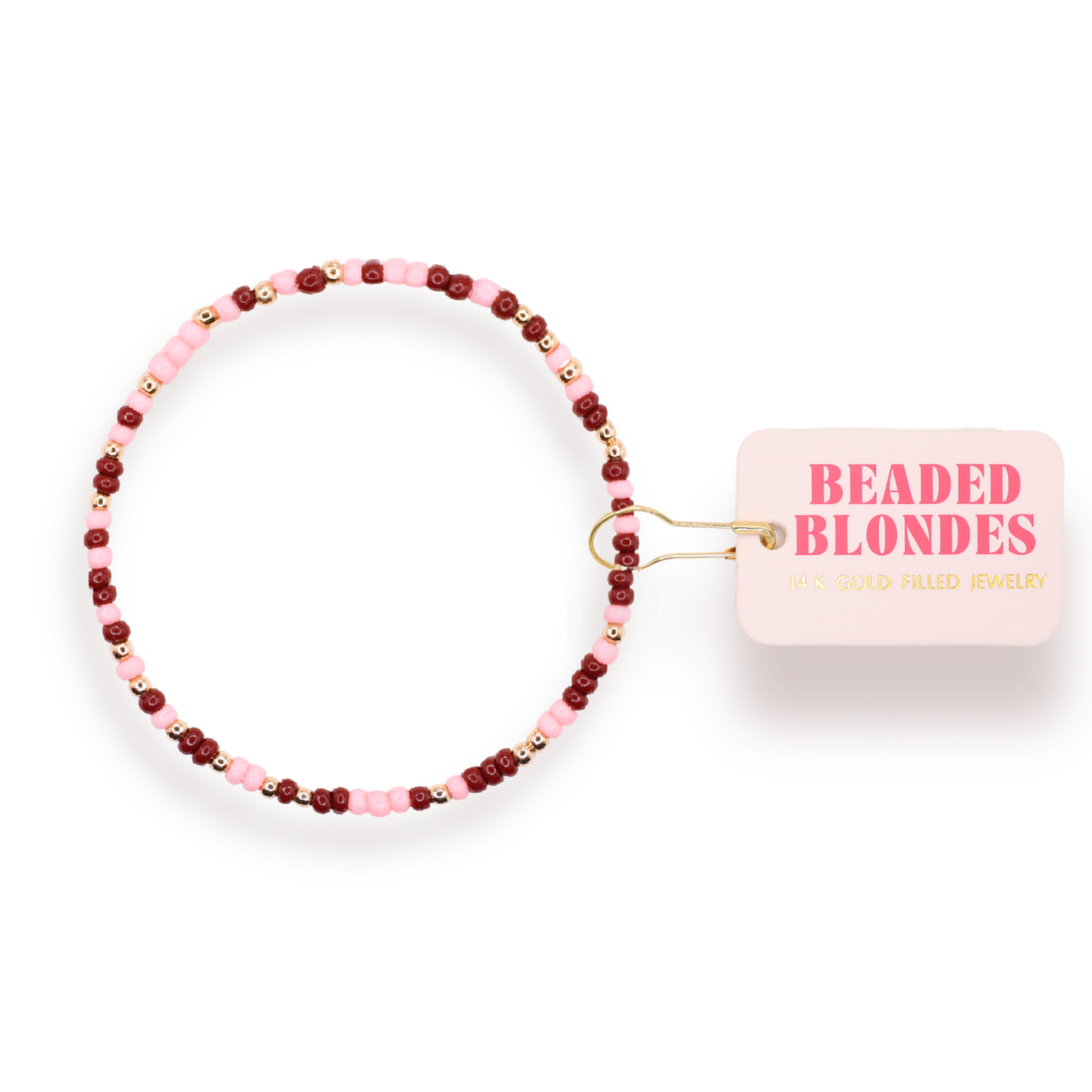 Beaded hair tie with 'Beaded Blondes' packaging on a white background