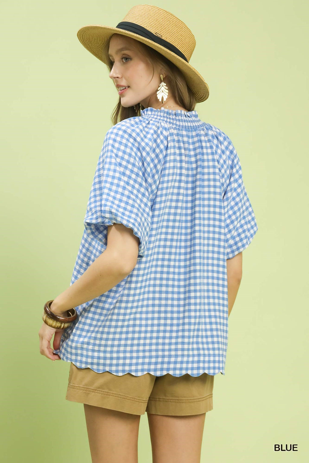 Back of a blue gingham scallop top