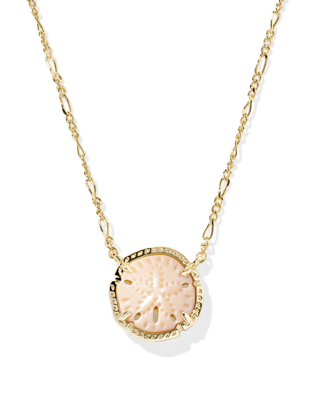 Gold necklace with a round, textured pendant on a white background