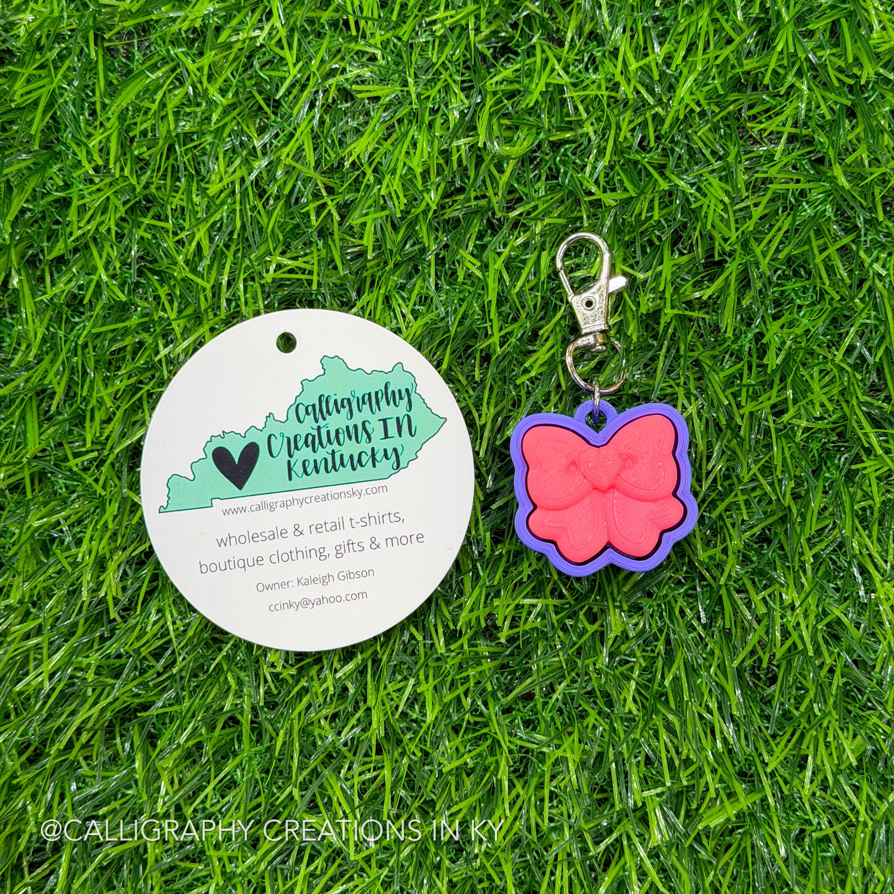 Neon Pink/Purple Bow Fidget Clicker Keychain