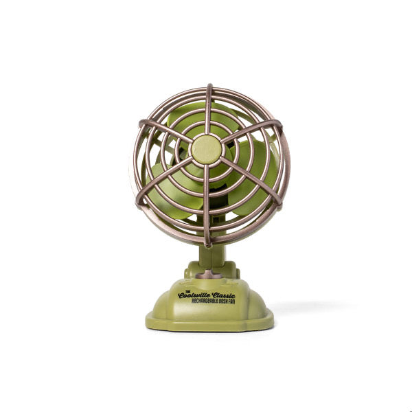Small green retro fan on a white background