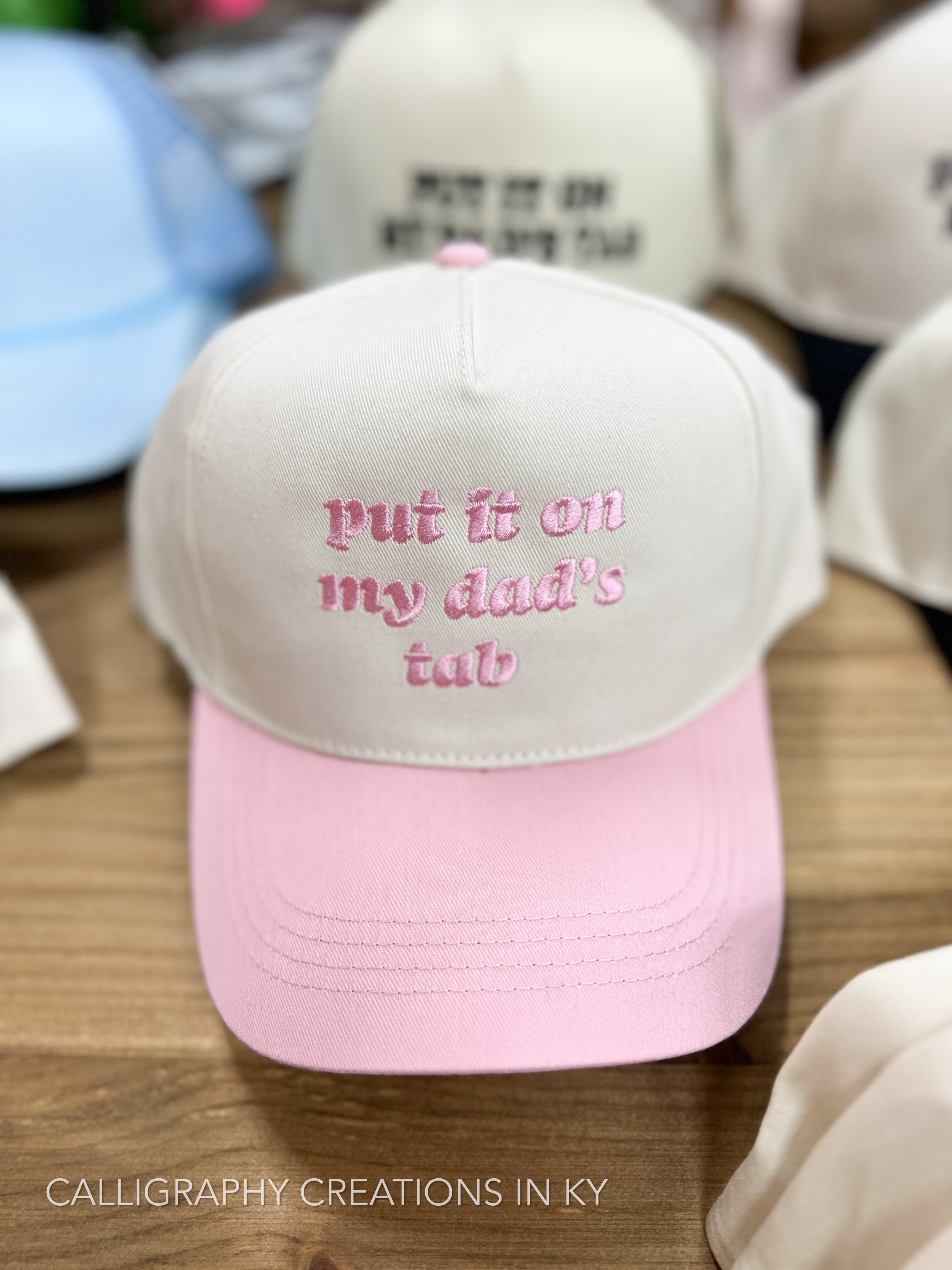 Pink | Put It On My Dad’s Tab Embroidered Trucker Hat