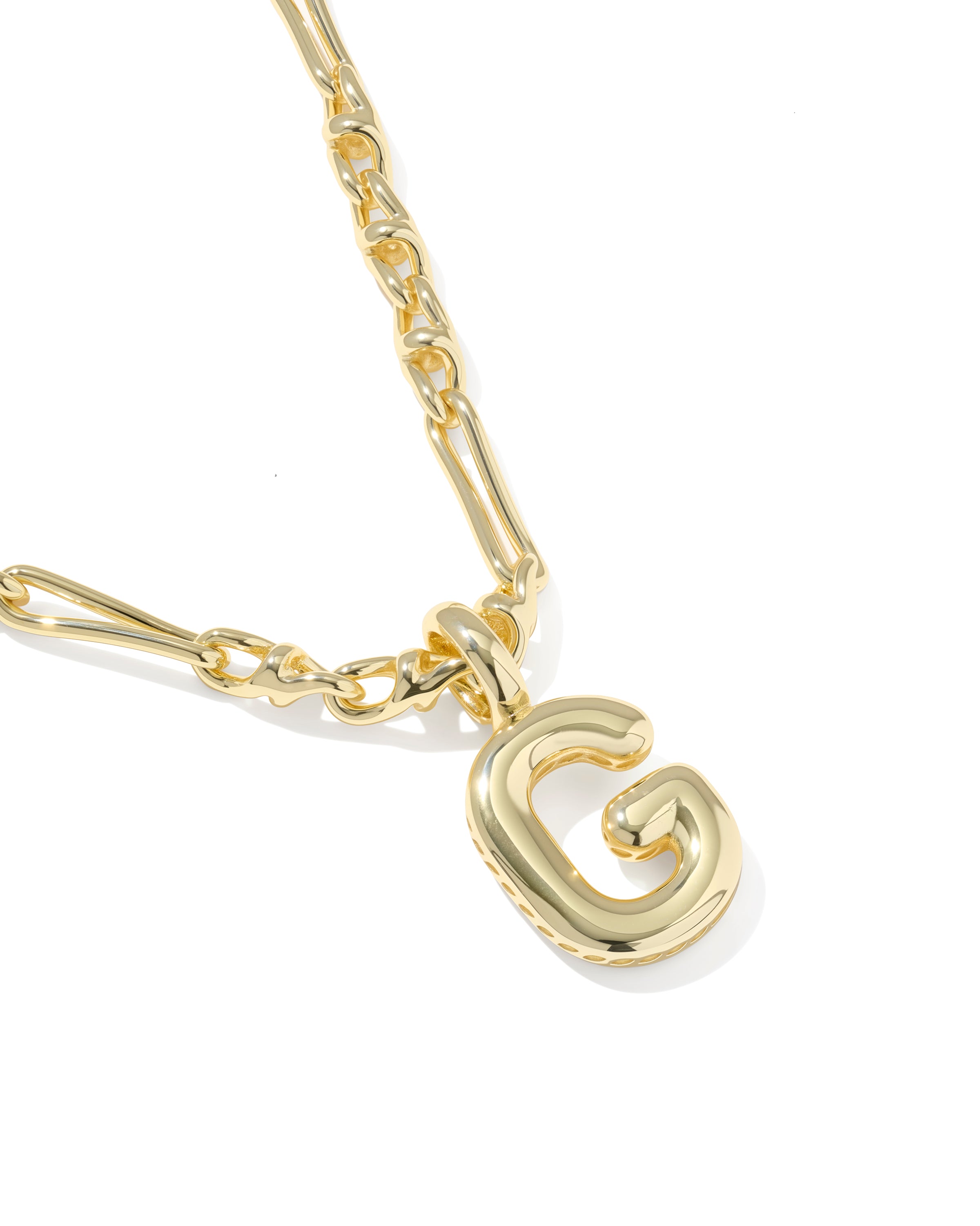 Gold necklace with a G-shaped pendant on a white background