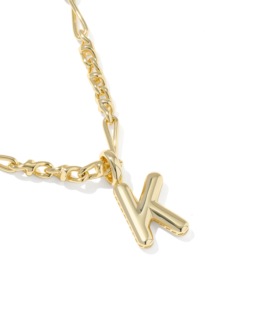 Gold necklace with a 'K' pendant on a white background