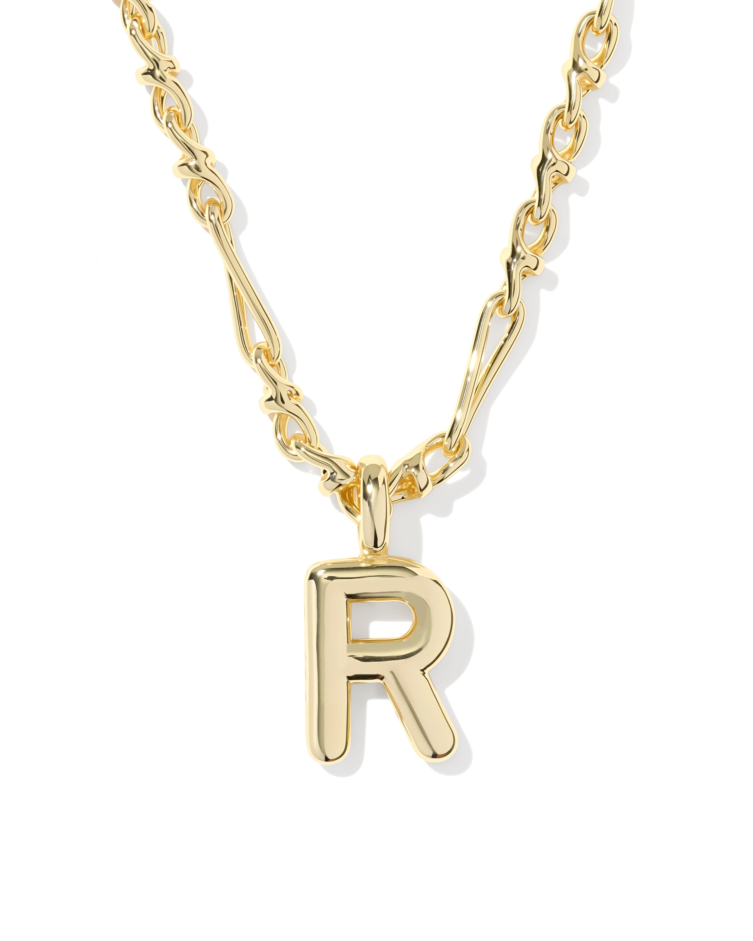 A gold initial necklace featuring a polished letter 'R' pendant on a twisted link chain, shown against a plain white background.