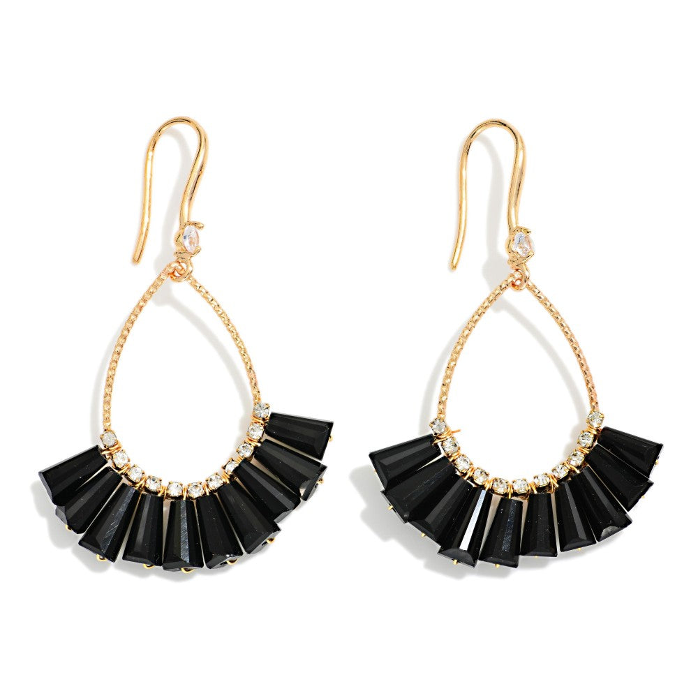 A pair of gold-tone dangle earrings with black pleated fan-shaped charms and small clear rhinestone accents, shown on a plain white background.