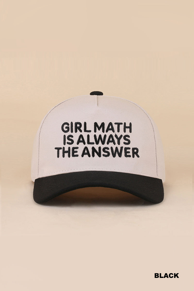 White hat with a black bill that reads “Girl math is always the answer” on a tan background