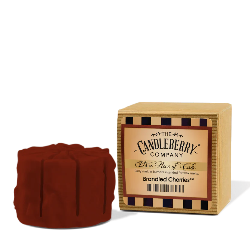 A wax melt cube beside its packaging box, which is red and has 'Candleberry' written on it.