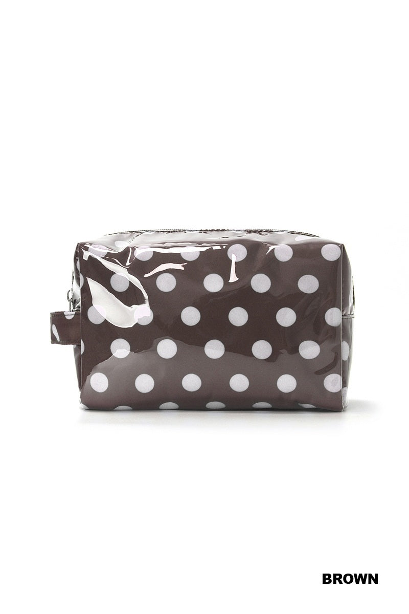 Brown and ivory polka dot zipper pouch on a white background