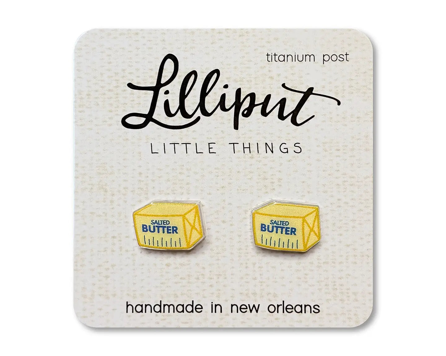Butter container earrings on a Lilliput Little Things branded card.