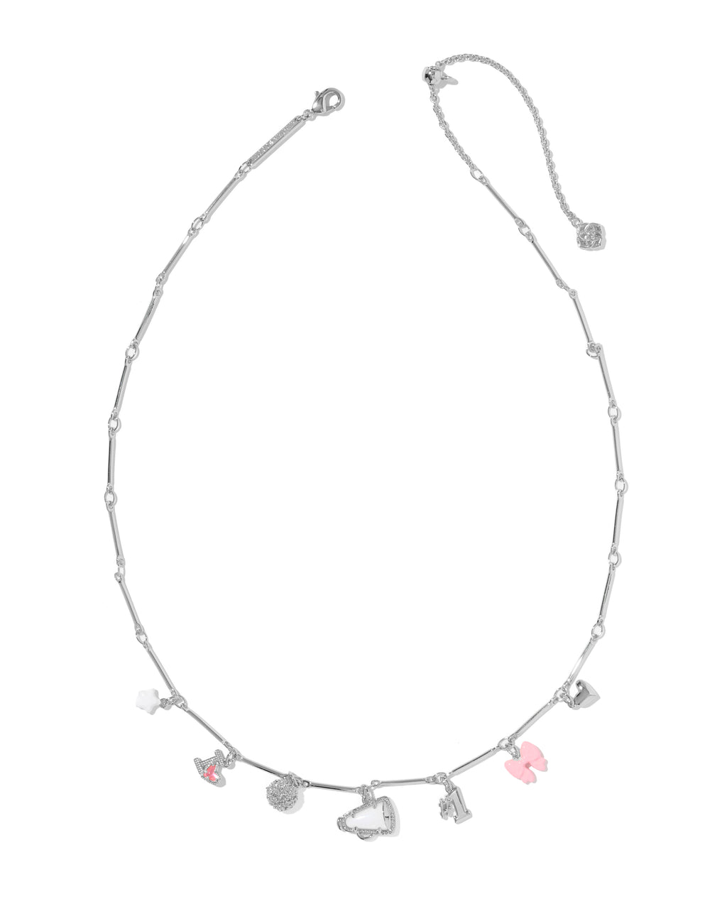 A silver beaded necklace with small dangling charms, including a pink bow, a pink heart, and a silver heart, shown on a plain white background.