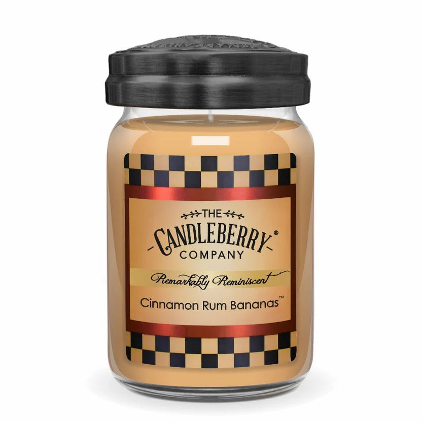 A jar candle with a label that reads 'Cinnamon Rum Bananas', suggesting a fragrance or scent associated with the product.