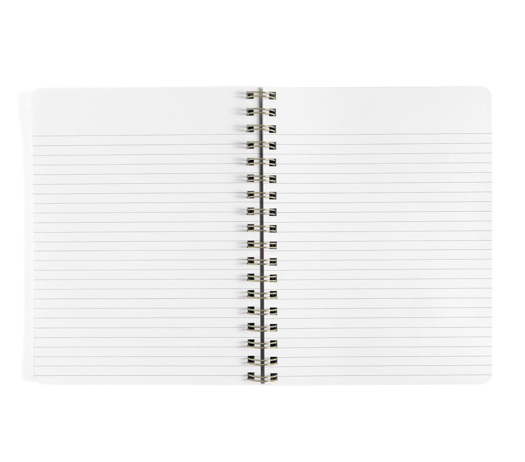 A white lined notebook with a silver spiral binding, shown open against a plain white background.