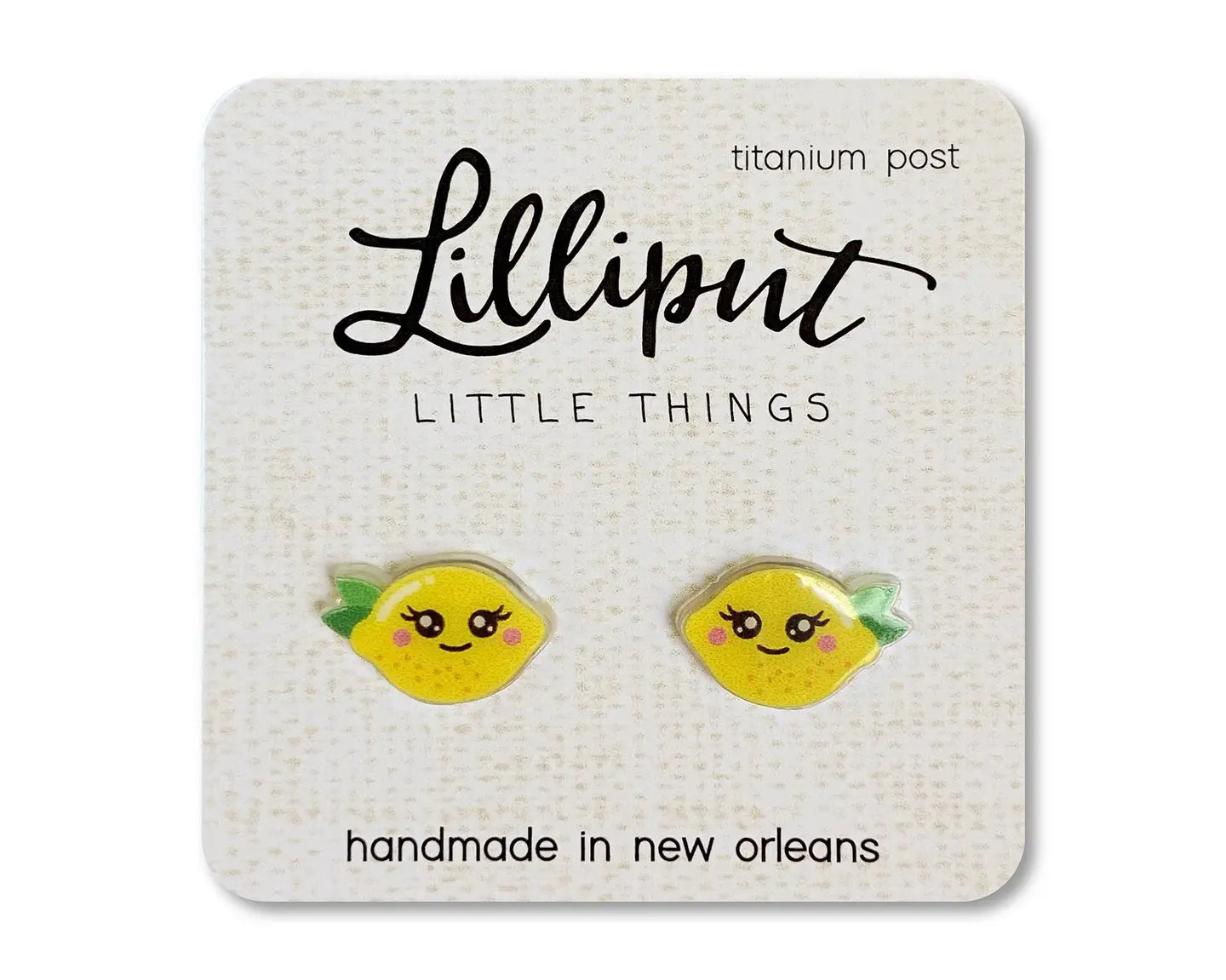 Lemon-shaped earrings on a Lilliput Little Things branded card.