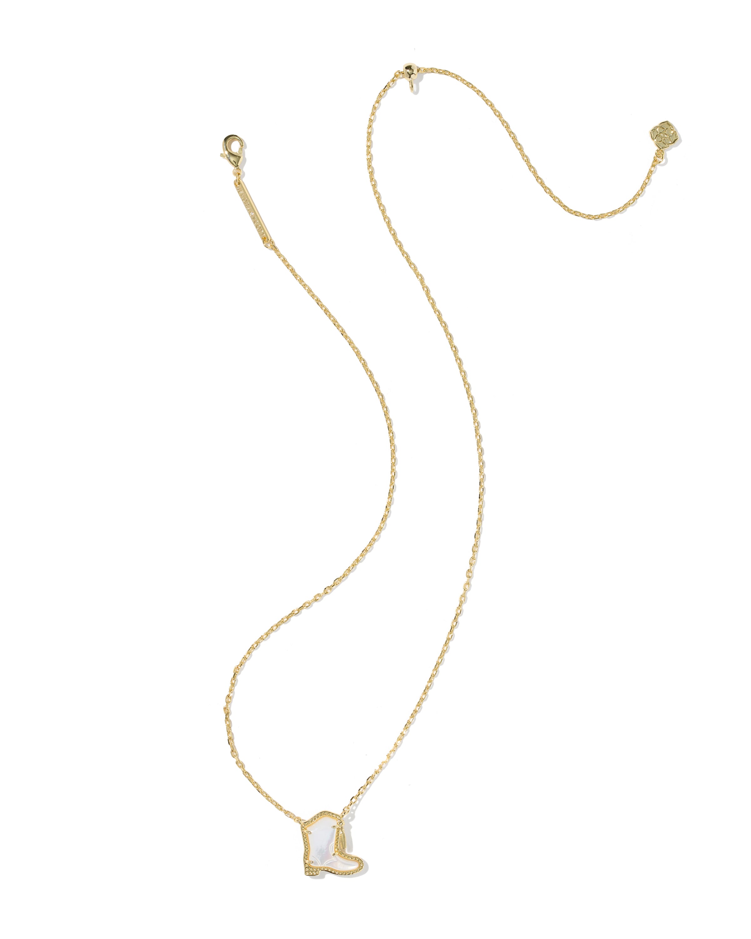 A delicate gold chain necklace featuring a small cowboy boot pendant with a white inlay, displayed on a clean white background.