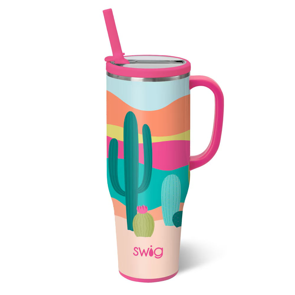 Colorful tumbler with cactus design and pink handle on a white background