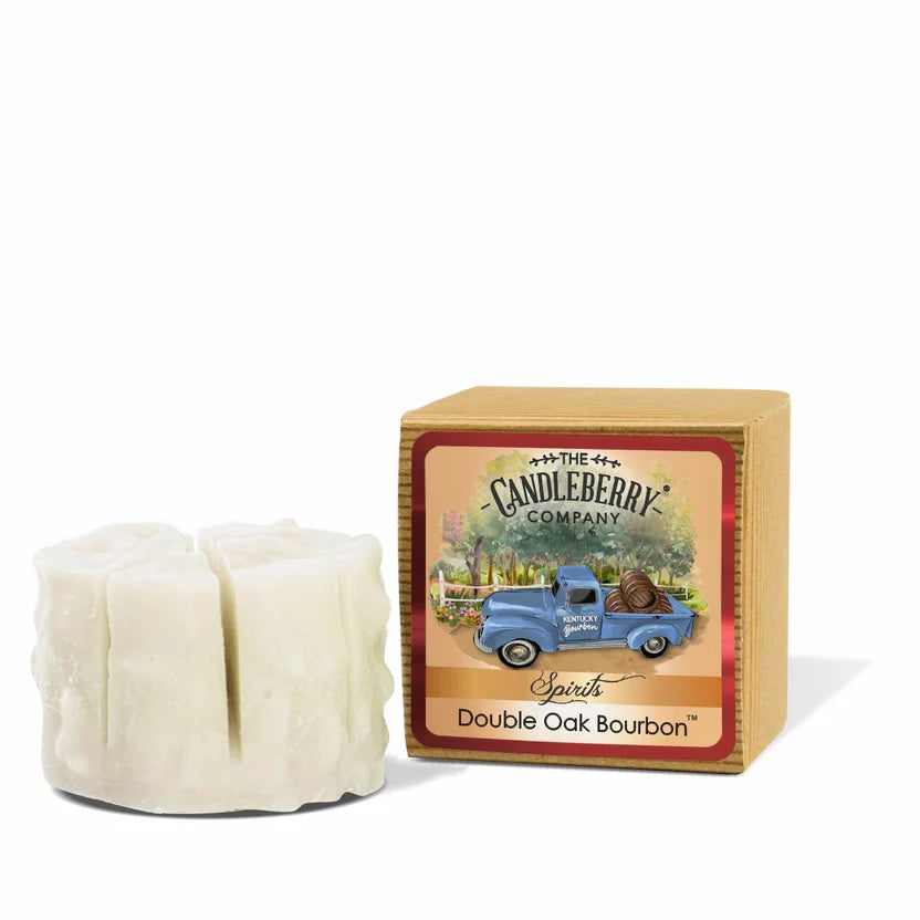 A package of white wax melt tarts with a label showing a blue truck and the words 'Double Oak Bourbon'.