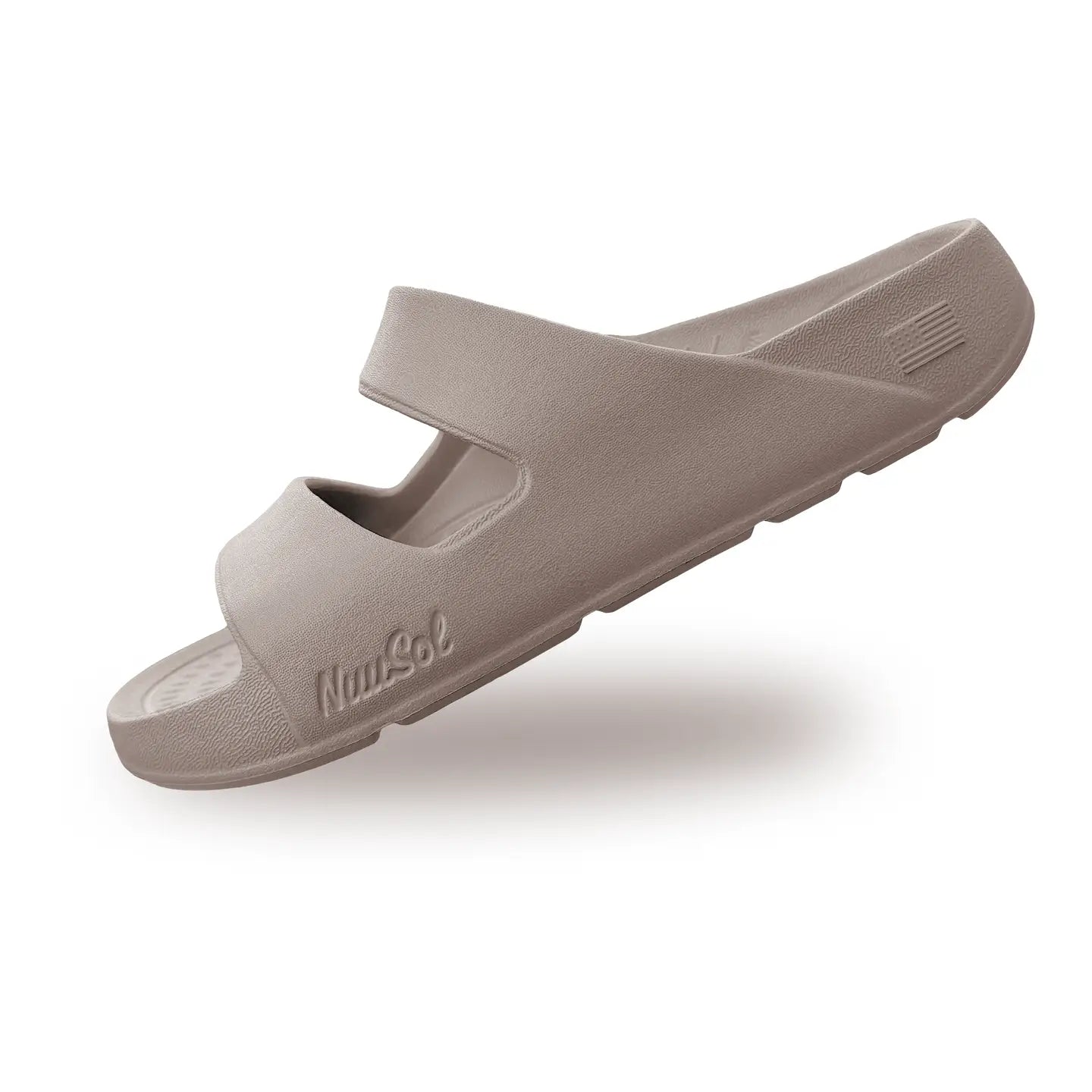 Tan two strap sandal on a white background