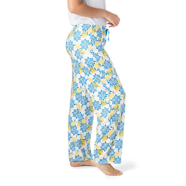 Lemon patterned pajama pants on a white background