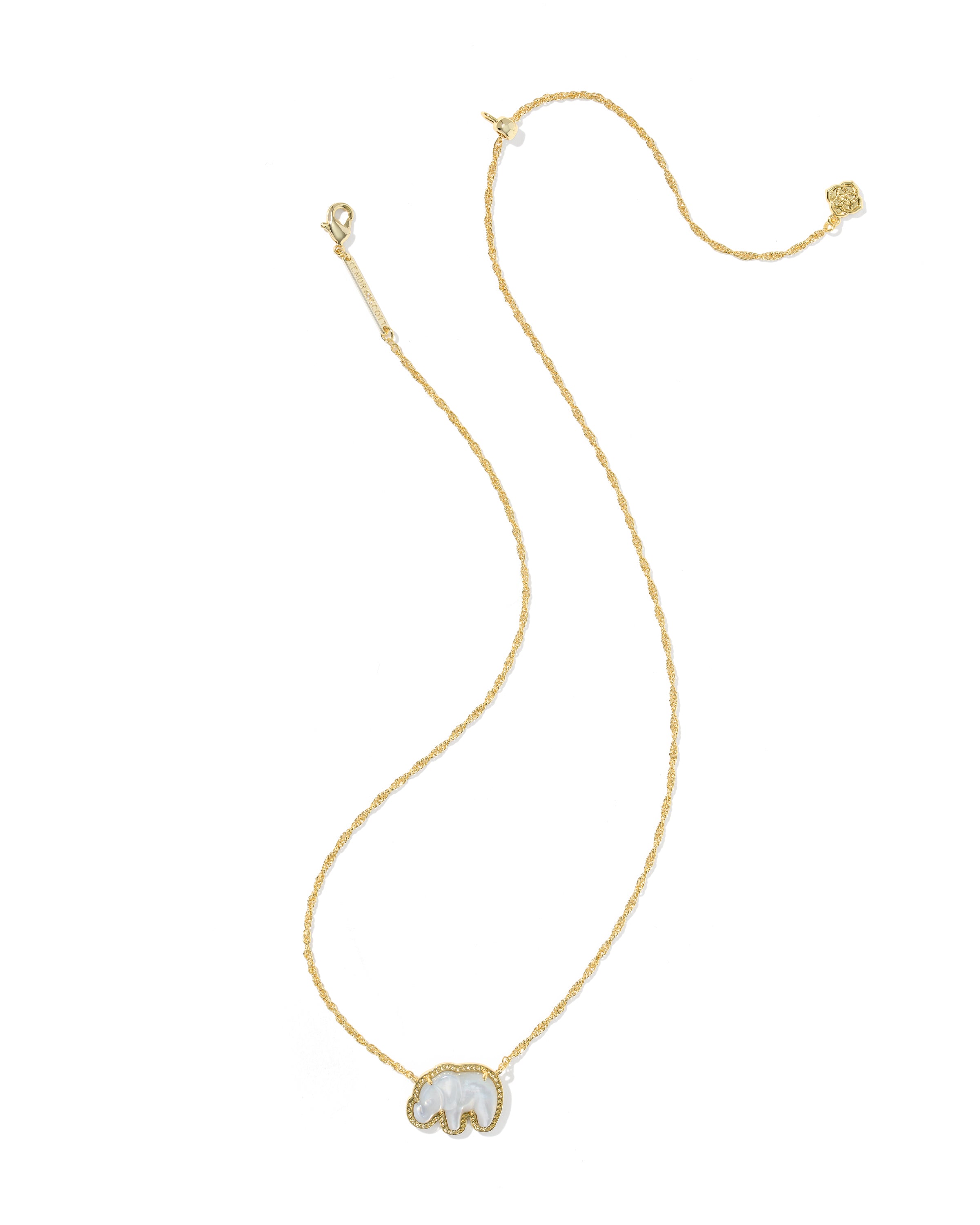 A delicate gold chain necklace featuring a small elephant pendant with a white inlay, displayed on a solid white background.