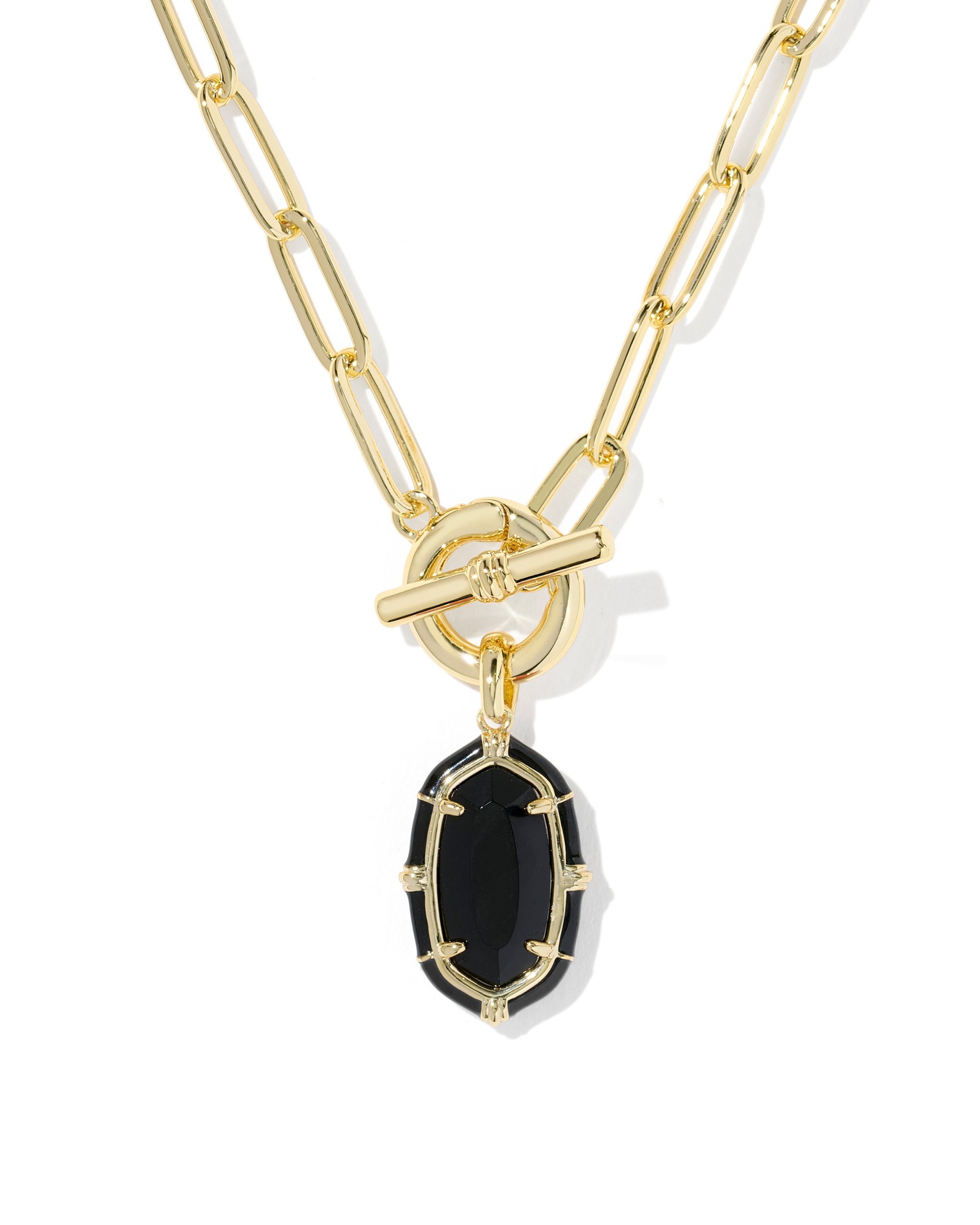 Gold necklace with a teardrop-shaped diamond pendant on a white background