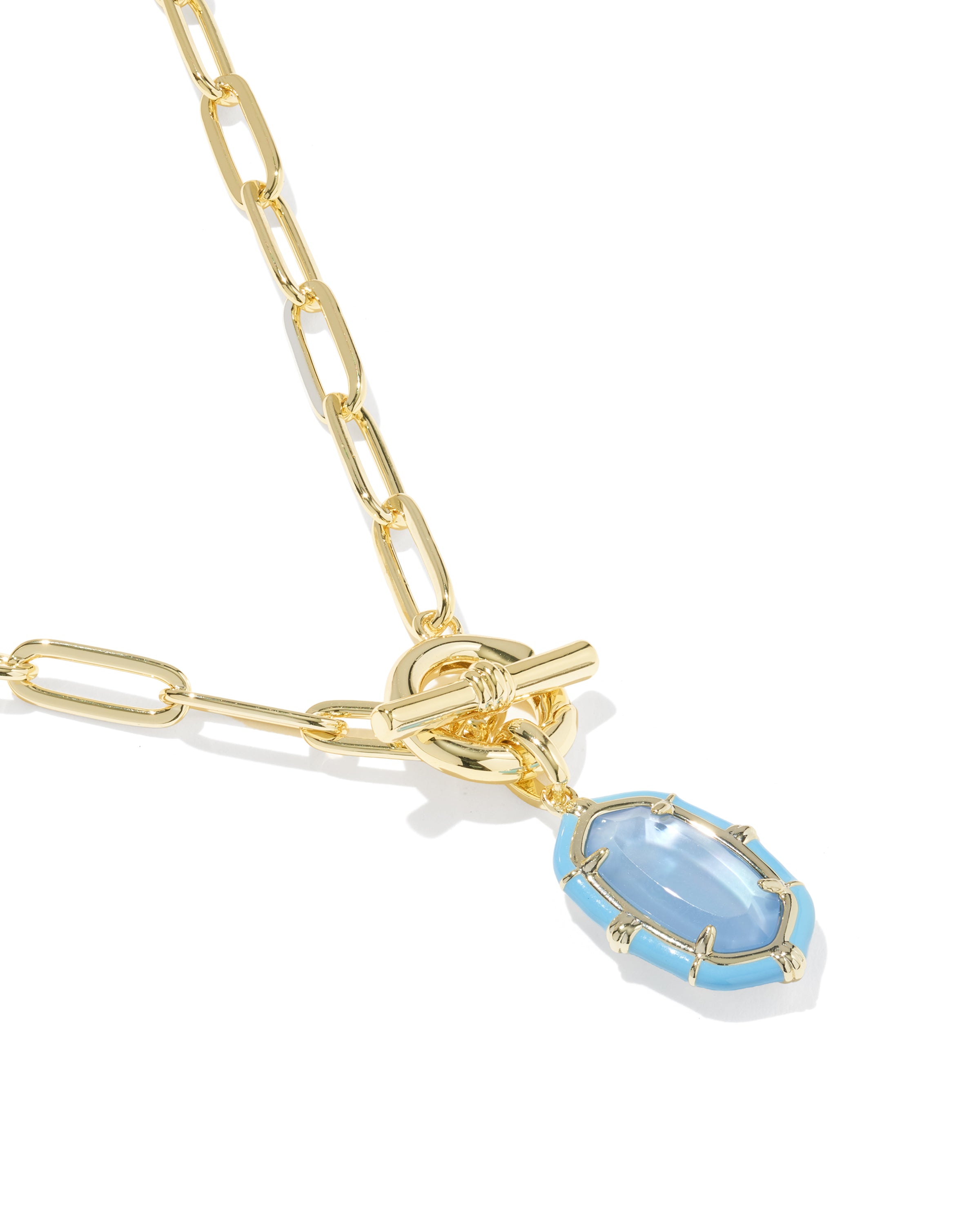 A gold paperclip chain necklace with a toggle clasp and a light blue oval pendant, shown on a clean white background.