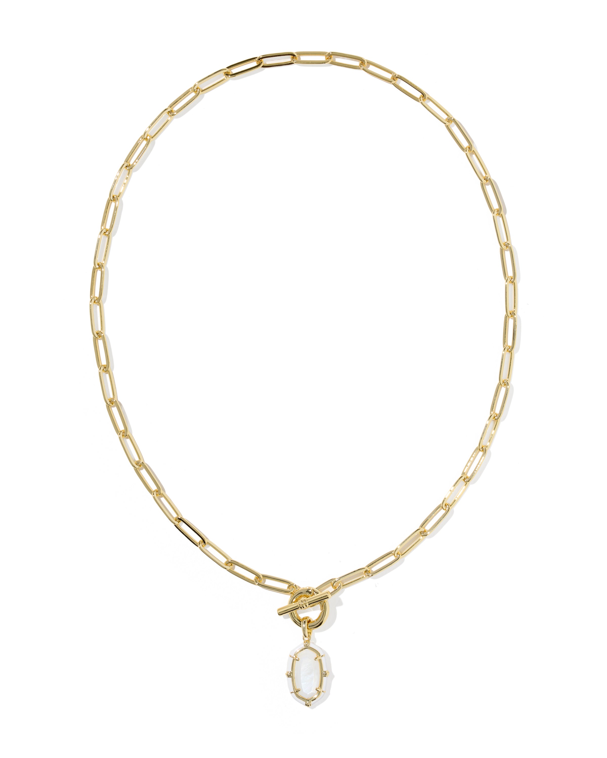 A gold paperclip chain necklace with a toggle clasp and a small oval white stone pendant, shown on a plain white background.