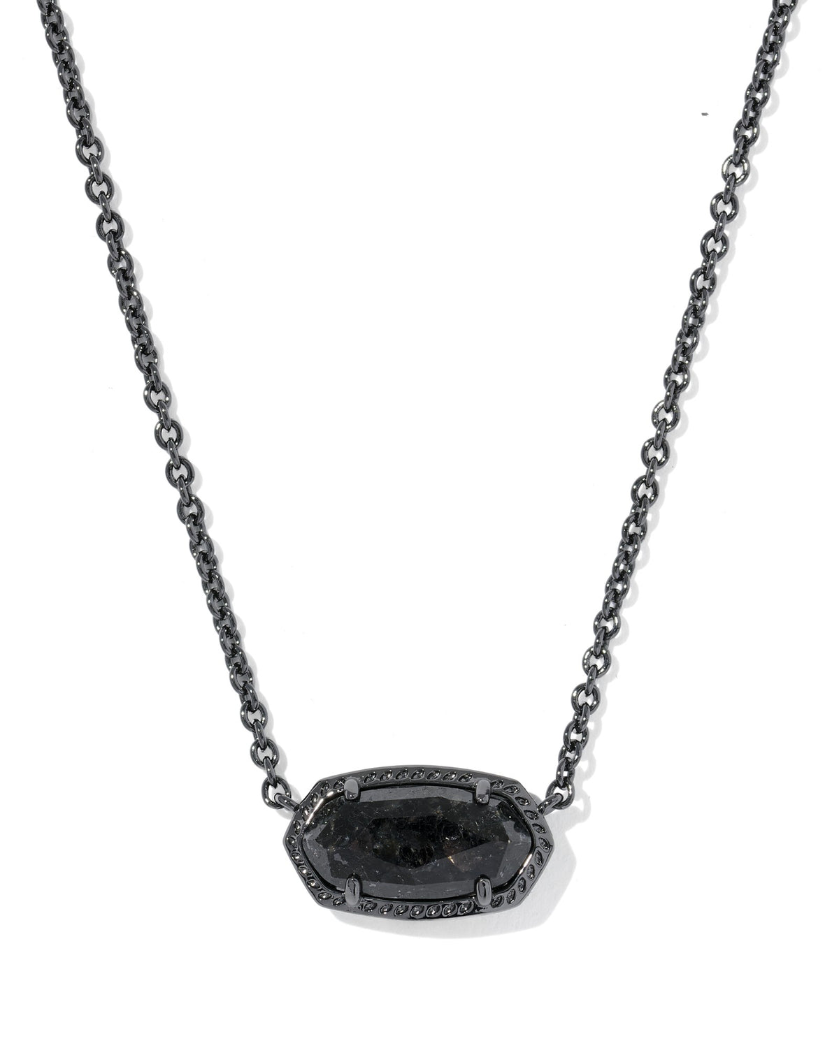A dark gunmetal chain necklace with an elongated hexagonal pendant featuring a central black stone and a halo of small clear stones, shown on a plain white background.