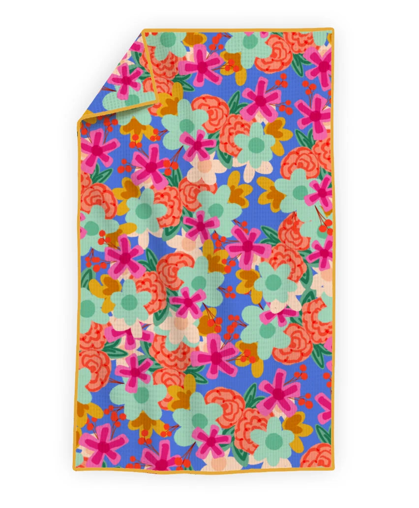 Colorful floral-patterned towel on a white background