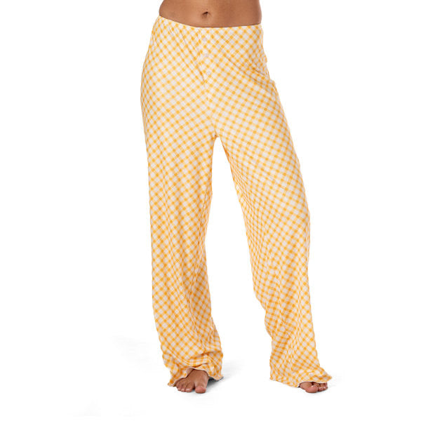 Yellow and white plaid pajama pants on a white background