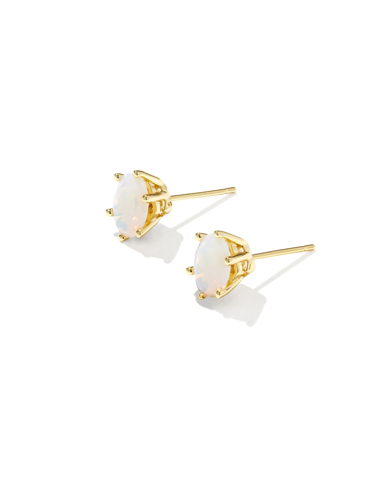 Kendra Scott stud earrings with white iridescent stones