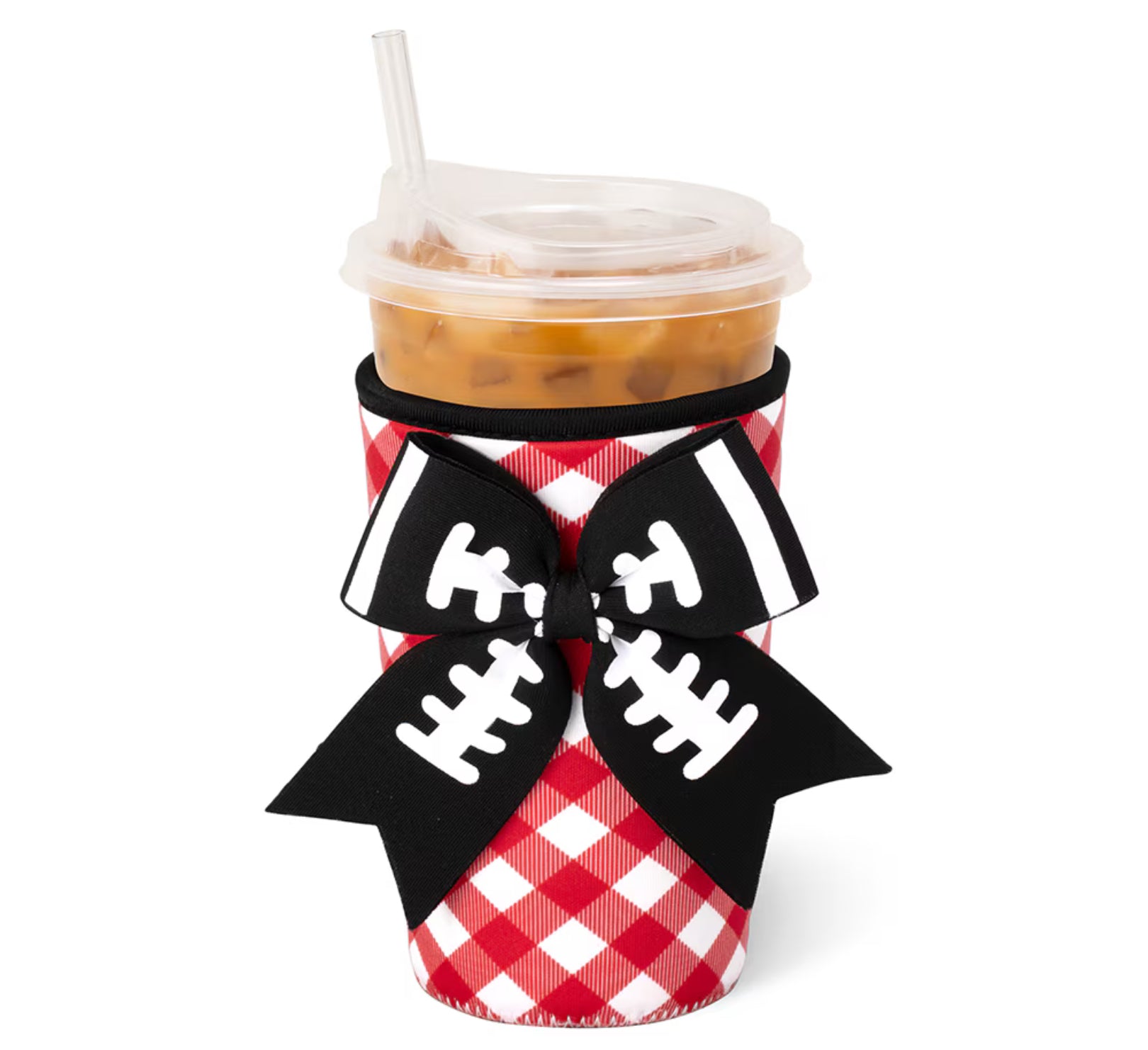 A red and white gingham-patterned cup sleeve with a large black ribbon bow featuring white football line details, shown on a clear-lidded iced coffee cup against a white background.