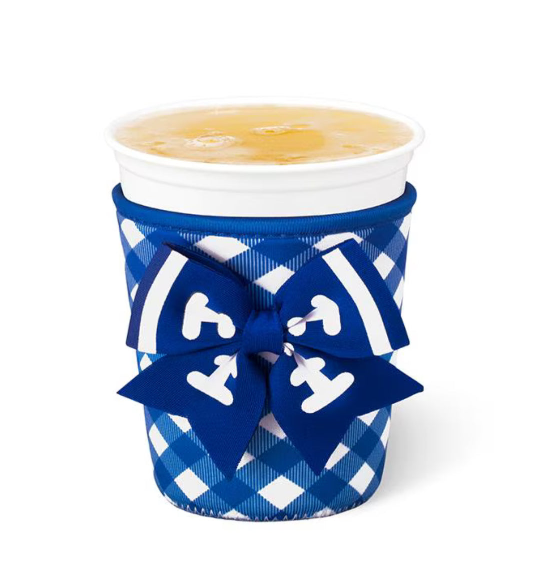 A white paper cup with a blue and white gingham patterned sleeve and a matching blue ribbon bow printed with white anchor motifs, filled with an orange beverage, on a white background.