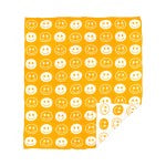 Happy face Patterned yellow and white blanket on a white background