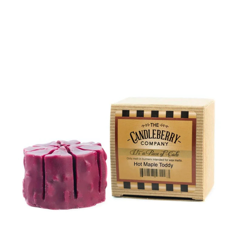 A red wax melt titled 'Hot Maple Toddy' from The Candleberry Company, displayed in front of its packaging box which has 'Hot Maple Toddy' and the company logo.
