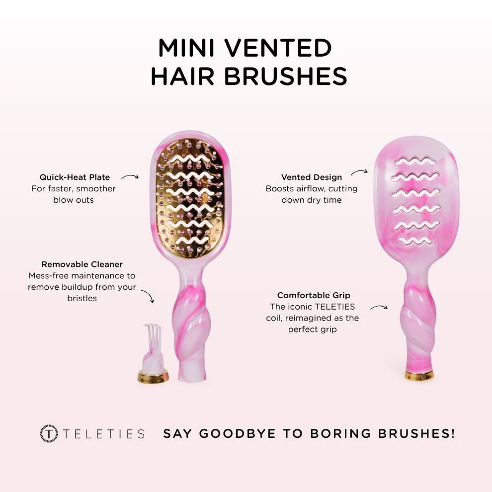 Mini vented hair brush with features highlighted on a white background