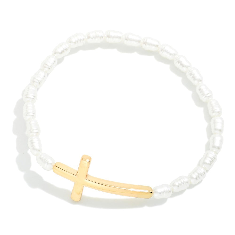 Ringed pearl stretchy bracelet with east to west cross