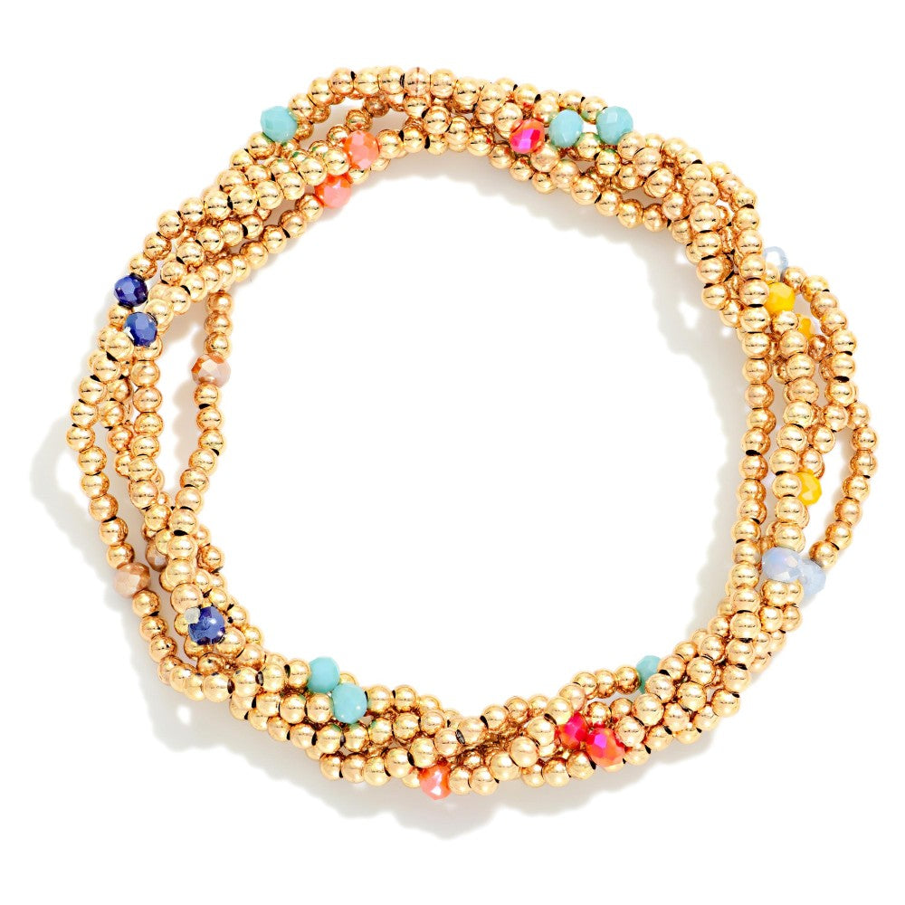 Set of 5 gold and colored beads