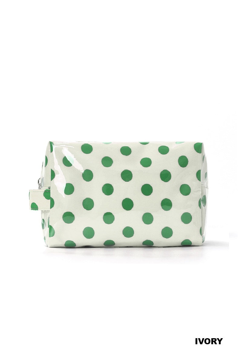 Ivory and green polka dot zipper pouch on a white background