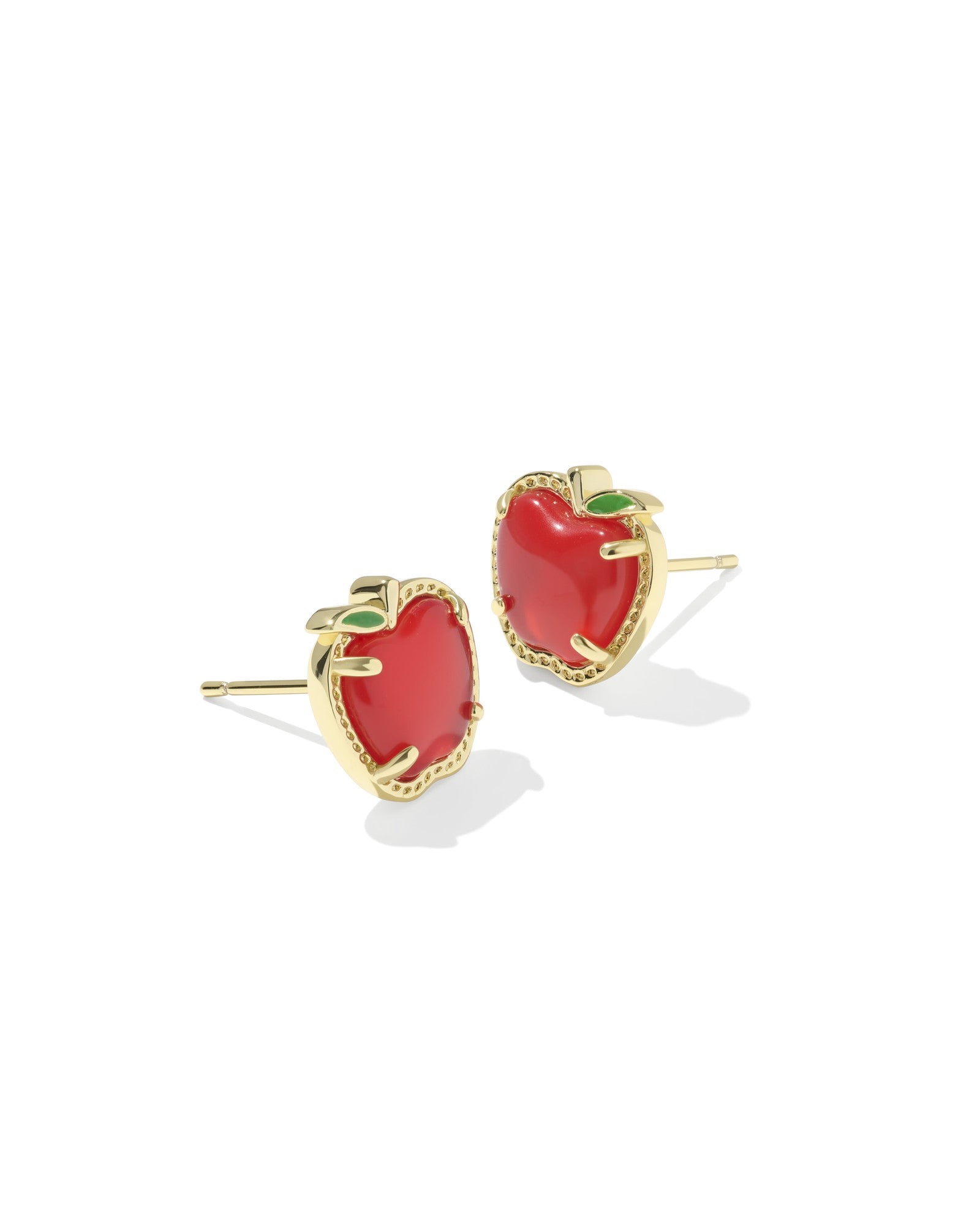 Red apple-shaped earrings with gold rims on a white background
