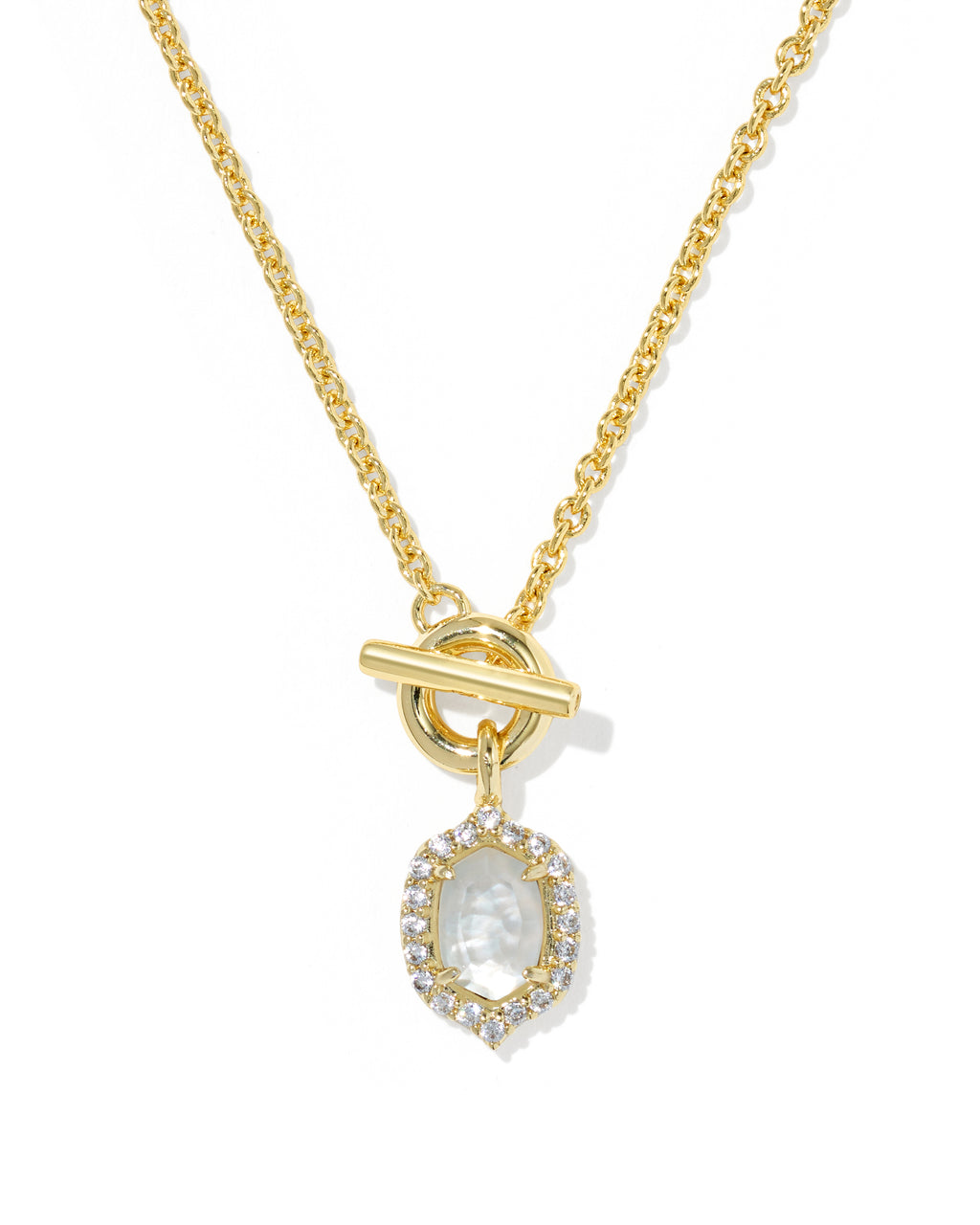 A gold chain necklace with a toggle clasp and a teardrop-shaped pendant featuring a white mother-of-pearl center stone surrounded by small clear stones, shown on a white background.