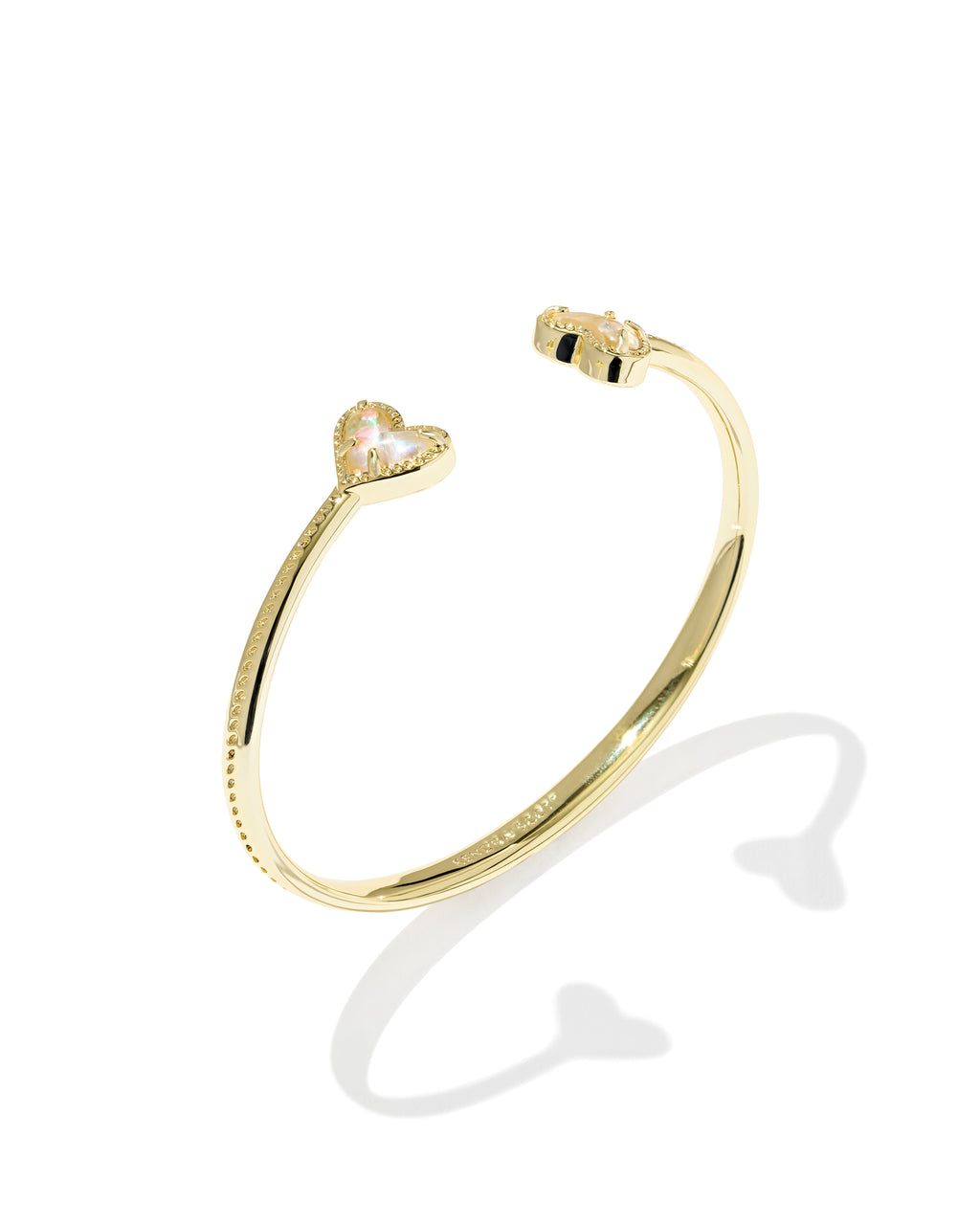 Kendra Scott bracelet with dichroic glass hearts
