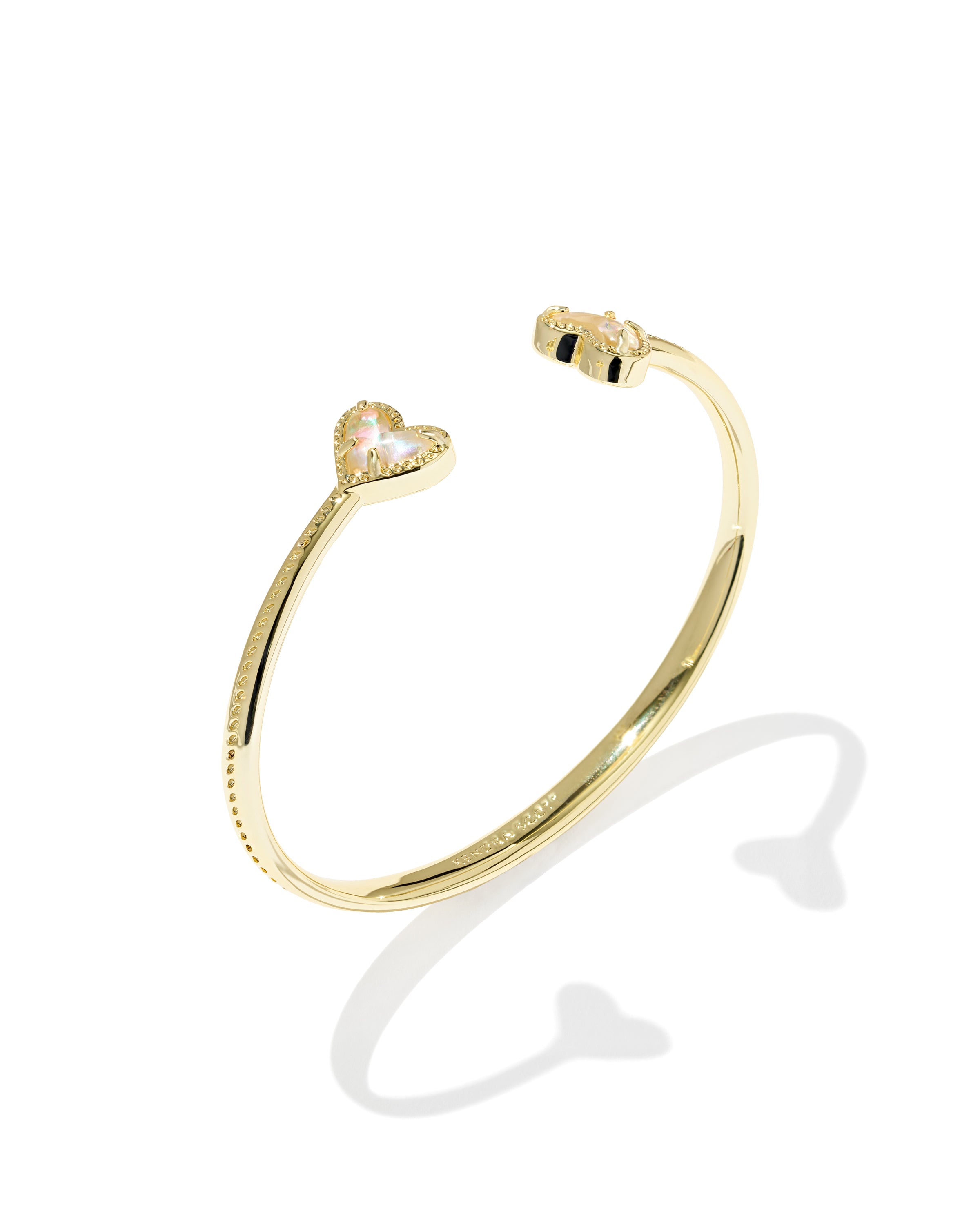Kendra Scott bracelet with dichroic glass hearts